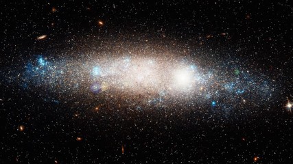 Wall Mural - Celestial spiral galaxy in outer space with bright flare light and moving stars. Contains elements furnished by Nasa