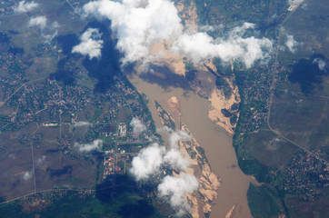 view of the city and the earth from the height of a flying plane