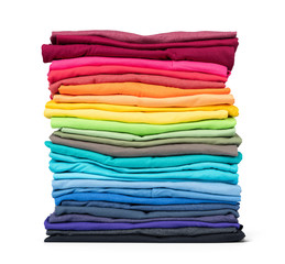 stack of colorful t-shirt isolated on white background. file contains a path to isolation.