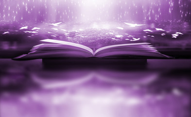 Poster - Imagine a picture book of an ancient book opened on a wooden table with a sparkling golden background. With magical power, magic, lightning around a glowing glowing book In the room of darkness