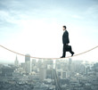 © peshkova - Businessman walking on rope