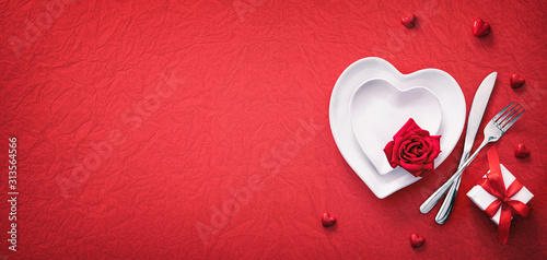 Red table setting cutlery for valentines days dinner Wallpaper Mural