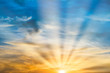 © Pavlo Vakhrushev - Beautiful dramatic sunset with sun rays and clouds