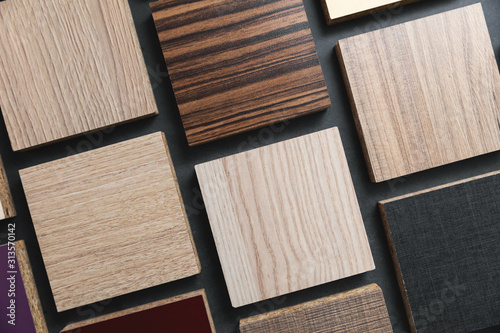 Fotomural laminate material samples on dark black background