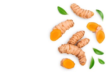 Wall Mural - turmeric root and slices isolated on white background with copy space for your text. Top view. Flat lay