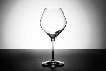 empty wineglass on black and white  background