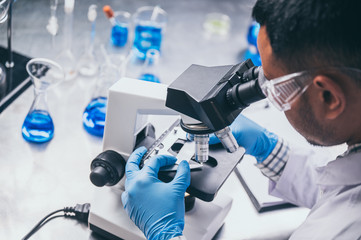 health care researchers working in life science laboratory, medical science technology research work