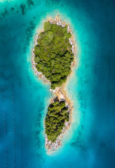 Wall Mural - aerial view on islands on sea. seascape from air on the summer time. azure water and islands with fo