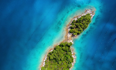Wall Mural - aerial view on islands on sea. seascape from air on the summer time. azure water and islands with fo
