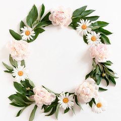 Wall Mural - wreath made of pink peonies, white chamomile and green leaves