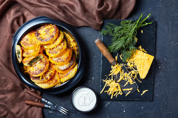 Wall Mural - potato cakes topped with grated cheddar cheese