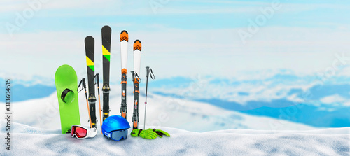 Cuadros en Lienzo Ski equipment pinned to the snow on top of a mountain