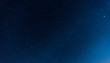 © Mohwet - Panorama blue night sky milky way and star on dark background.Universe filled with stars, nebula and galaxy with noise and grain.Photo by long exposure and select white balance.selection focus.amazing