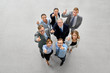 © Syda Productions - business, people and teamwork concept - happy smiling business team pointing fingers up to camera