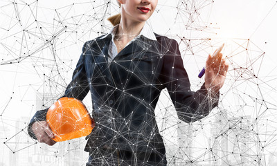 Canvas Print - Businesswoman pointing on abstract 3d network