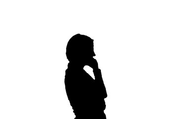 Silhouette of person talking on a cell phone