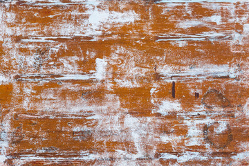 rusted metal surface with white patches