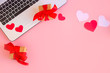© urika - Valentines background with red heart, laptop. Valentines Day greeting card. Female workplace. Top view