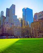 Skyline With Skyscrapers And American Cityscape In Bryant Park In Midtown Manhattan, New York, USA. United States Of America. NYC, US.
