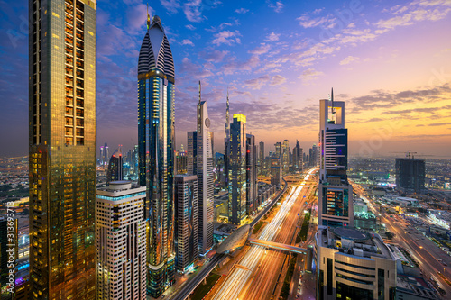 Aerial night view of the skyscrapers along the Sheikh Zayed Road in Dubai, UAE Wallpaper Mural