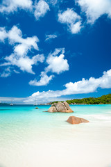 Wall Mural - Bright scenic view of granite boulder landscape of Anse Lazio beach on Praslin Island in the Seychelles