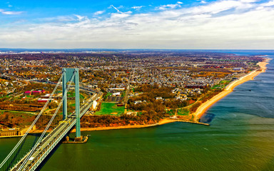 Wall Mural - Aerial view with Verrazano-Narrows Bridge over Upper Bay and Lower Bay. It connects Brooklyn and Staten Island. Manhattan Area, New York of USA. United States of America, NYC, US.