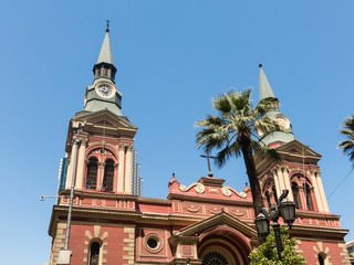 Wall Mural - The Basilica de la Merced, with its two pointed domes and intense red color. Built in 1566, it was rebuilt in 1760 after a major earthquake. Santiago of Chile