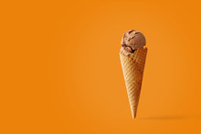 Ice Cream Cone With Caramel Flavors On A Pink Background