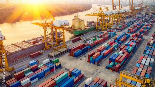 Cuadros en Lienzo Logistics and transportation of Container Cargo ship and Cargo plane with workin