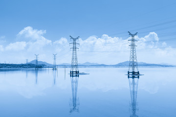 Wall Mural - power transmission pylon on lake