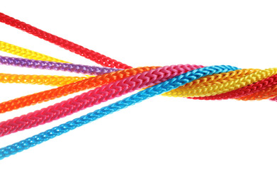 Twisted colorful ropes isolated on white. Unity concept