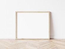 Horizontall Wood Frame Mock Up. Wooden Frame Poster On Wooden Floor With White Wall. Landscape Frame 3d Illustrations.