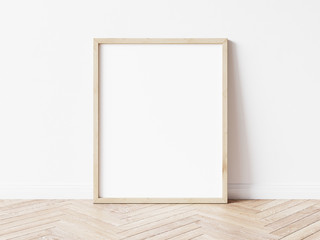 vertical wooden frame mock up. wooden frame poster on wooden floor with white wall. 3d illustrations