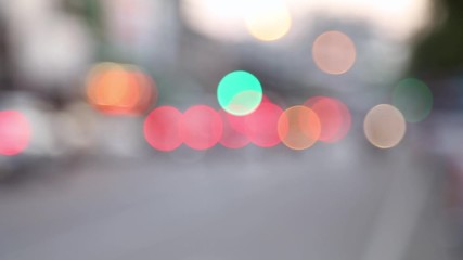 Wall Mural - Blurred bokeh traffic on the road at night in a big city.