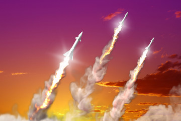 Modern strategic rocket forces concept on sunset background, ballistic warhead attack - military 3D Illustration