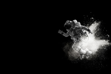 Wall Mural - Spaceman running fast. Mixed media