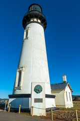 Wall Mural - The Yaquina Head Lighthouse and Fishermen's Plaque, Newport, Oregon, USA