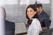 © Rido - Business woman in board room