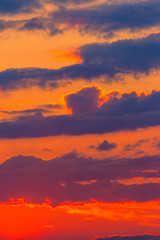 Wall Mural - orange sunset sky with clouds. beautiful nature background