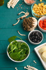 Wall Mural - Salad ingredients, fresh and healthy nutrition. Vegetarian food. Top view. Menu, recipe book. Vertical frame.