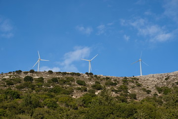 wind turbines on blue sky