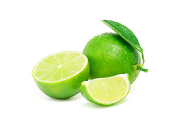 Wall Mural - Fresh lime cut half and sliced with green leaf and water drop isolated on white background with clipping path