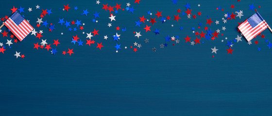 Wall Mural - American flags and confetti stars on blue background. Happy Presidents Day Banner mockup. USA Independence Day, Labor Day, Memorial Day, US election concept.