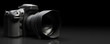 Leinwandbild Motiv Professional digital camera on black