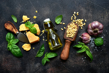 Wall Mural - Ingredients for making traditional italian sauce pesto. Top view with copy space.