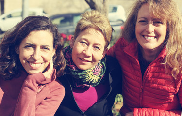 Sticker - Portrait of three mature beautiful women outside