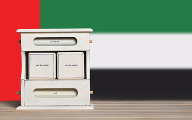 Fototapete - Retro calendar with free space for a date on the background of the flag of the United Arab Emirates. Template for writing dates of national holidays of the United Arab Emirates with free text space