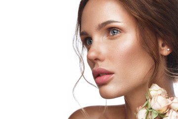 Wall Mural - beautiful woman with classic nude make-up, light hairstyle and flowers. beauty face.