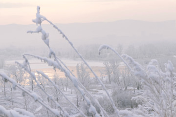 Wall Mural - Winter landscape - view of the river and mountains in the distan