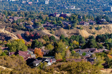 Wall Mural - Residential houses on mountain slopes on a sunny day